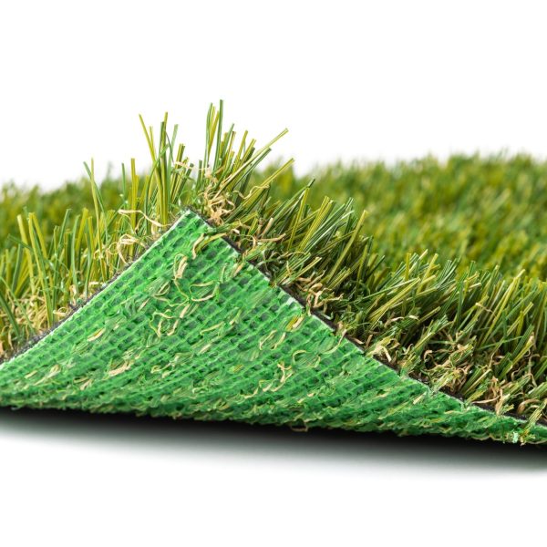 Flipped Up Section of Artificial Turf Grass On White Background.