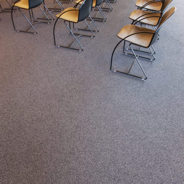 Folding chairs lined up for a business meeting